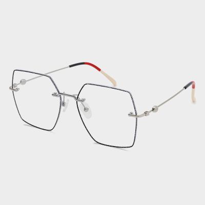 China 2020 Italy newest design anti blue light proof rimless glasses pearl powder polygon frame fashion glasses female for sale