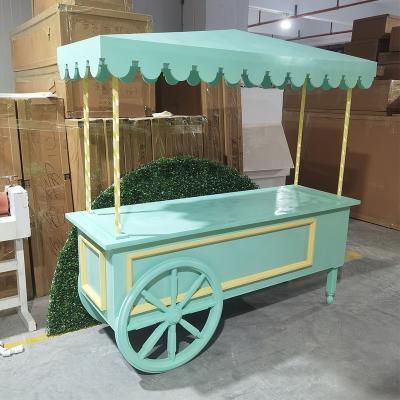 China Durable Latest Design Style Elegant Green Acrylic Dessert Display Candy Rolling Carts For Parties for sale