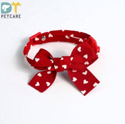 China Pet Love Polka Dot Bowknot Christmas Customization Pendant Bell Adjustable Pet Stocked Necklace for sale