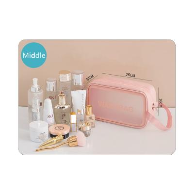 China Transparent Logo Waterproof Custom Travel Toiletry Make Up Organizer Washing Bags Makeup Brush Bag Customize Pouch PVC Clear Cosmetic Bag for sale