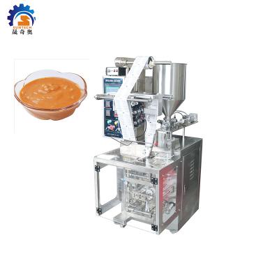 China Yellow Oil Paste Oil Packaging Machine Sachet Liquid Food Curry Packaging Machine for sale