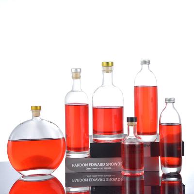 China Wholesale empty hot drink smirnoff whiskey wine bottle 500ml 750ml vodka brandy frosted wine glass bottles for sale