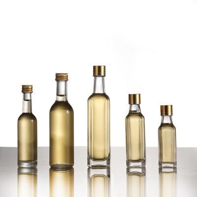 China Newest Design Good Quality Popular Food Product 100ml Olive Oil Glass Bottle for sale