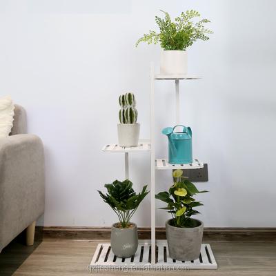 China Sustainable Four Tier Floor Shelves Plant Stand Metal Plant Stand Flower Rack for sale