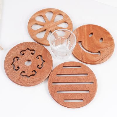 China Viable Custom Wholesale Accessories Kitchen Heat Insulation Classic Natural Dining Table Round Wooden Mat Coaster for sale