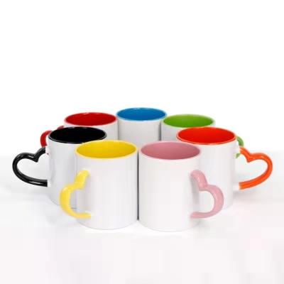 China Viable Sublimation White Coating Ceramic Handle Color Changing Heart Mug Mug for sale