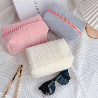 China Fashion For Women Travel Organizer Lattice Small Square Cute Portable Toiletry Makeup Bag Plush Cosmetic Bag for sale