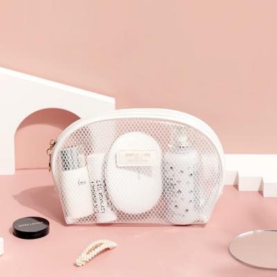 China 2022 New Style Fashion Storage Personal Clear Mesh Make Up Bag Custom Logo EVA Cosmetic Bag Transparent Semicircle Shell Pouch TPU for sale