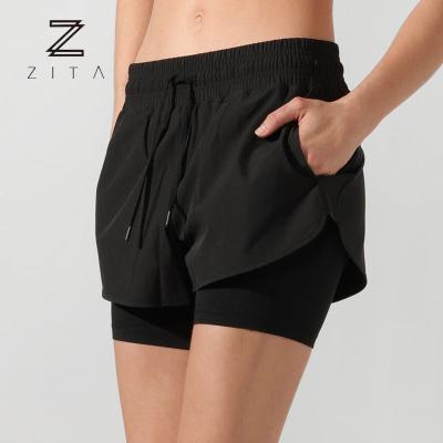 China Breathable Women Mid Waist Sportswear Moisture Wicking Gym Shorts 2 Layer Running Shorts for sale