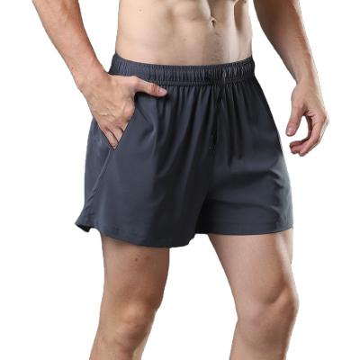 China Quick-Drying Sports Shorts Solid Color Drawstring Breathable Sports Shorts Outdoor Border Leisure Breathable Quarter Men for sale