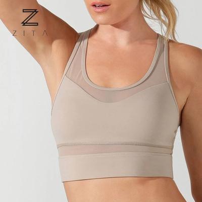 China High Quality Breathable Compression Yoga Wear Women Yoga Bra Padded Fitness Mesh Panel Strappy Sports Bra for sale