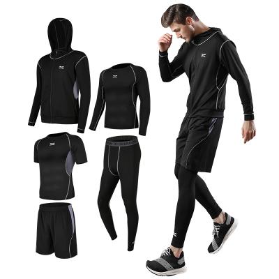 China 2022 Latest 5 Piece Fitness Jogging Sports Suit Men Yoga Training Breathable Sports Suit for sale