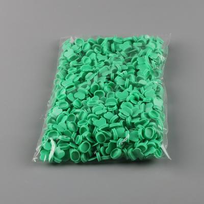 China Light green injection lid heart cap 30000pcs per carton for sale