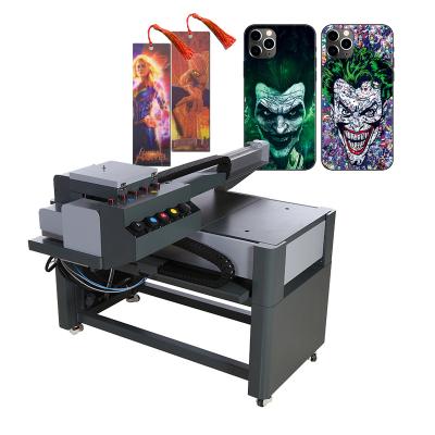 China 6090 Color Digital Hotels 6090 UV Inkjet Flatbed Plotter UV Led Photo Printer Machine For Book Phone Ceramic Case Glass Plywood for sale