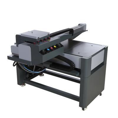 China 2022 Hotels Acrylic Glass Leather PVC Printing Digital Inkjet XP600 Flatbed 6090 Printer A1 A2 A3 UV Flatbed Printer for sale