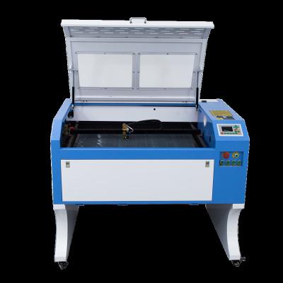 China Small Frmat 6040 50W Water Cooled Fabric Cutter Engraving Nonmetal CO2 Laser Cutting Machine For Fabric Acrylic Wood Leather for sale