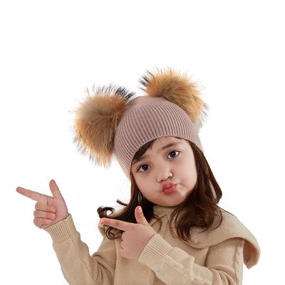 China COMMON baby boy girl winter woolen hat fluffy angora beanie with raccoon fur pom pom wholesales for sale