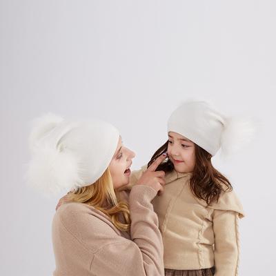 China Fashion COMMON Winter Custom Cashmere Knitted Pom Pom Hat For Women Mom Baby Hat Set for sale