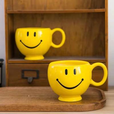 China 500ml Best Viable Selling Smile Face Mug Ceramic Mug For Tea Or Coffee for sale