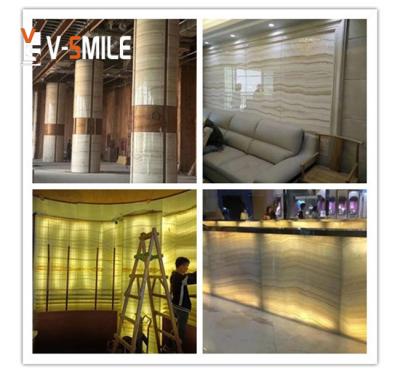 China Modern Backlit Natural Straight White Wood Slab Marble Vein Panel Wall Onyx Translucent Onyx Onyx for sale