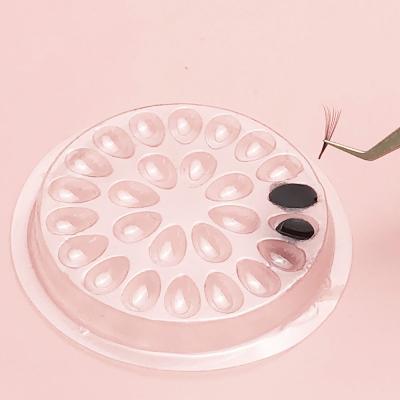 China Eyelash Extensions NAGARAKU Adhesive Eyelash Extension Glue Holder Palette Pads Disposable Clear Plastic PVC Glue Tray for sale