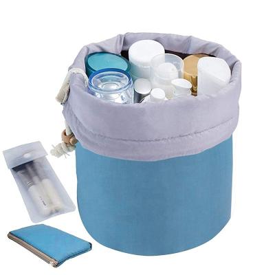 China Large Capacity Women Fashion Round Travel Waterproof Drawstring Cosmetic Pouch Makeup Bag for sale