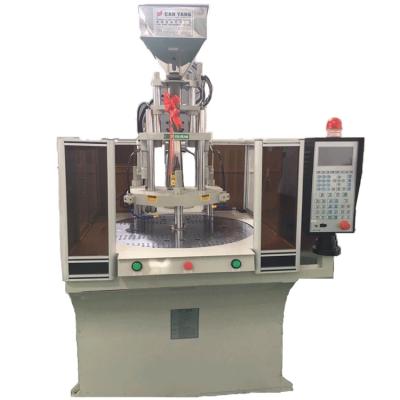 China Car Accessories Rubber Bumper Rotational Vertical Injection Molding Machine en venta