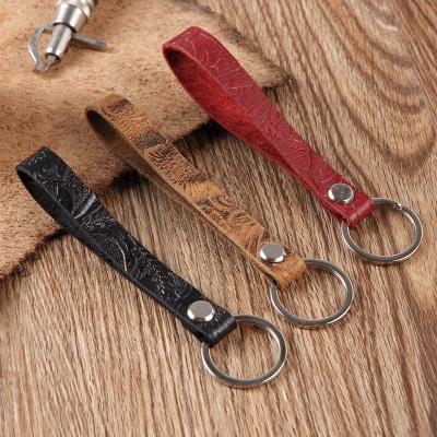 China Fashion Fashion Cut Out Pattern Genuine Leather Key Chain For Men And Women Promotion Gift for sale