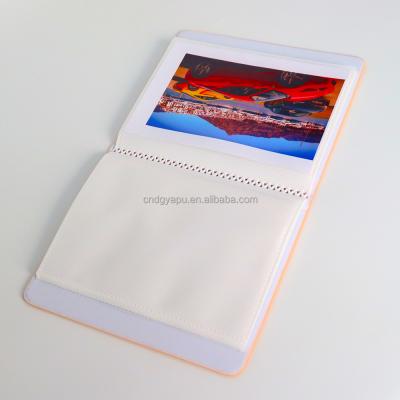 China Hot custom shell 4*6 inch PU leather factory sale grid photo album ultrasonic single pressed collection book for sale