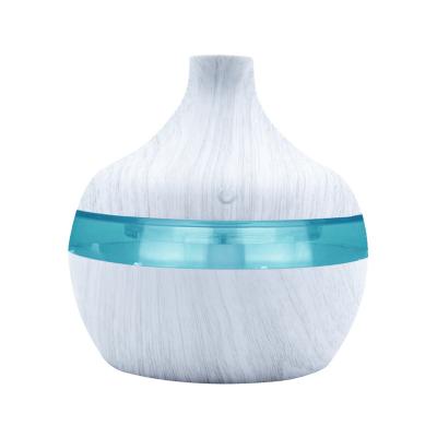 China 2021 New Air Humidification+Light Ultrasonic Led Wood Grain Cool-Mist Mini Vase Shape Diffuser Humidifier Portable Humidifier for sale