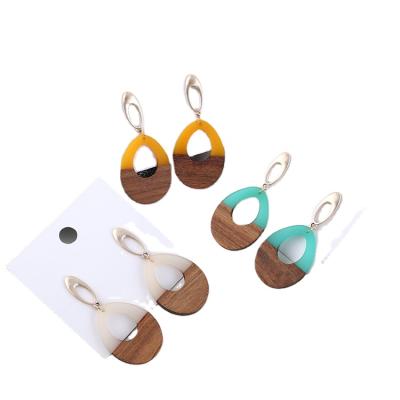 China FASHIONABLE European and American piercing jewelry for women wooden design water drop earrings for sale