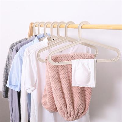 China Wholesale price durable khaki convenient plastic hanger for clothing coat hanger wholesale for sale