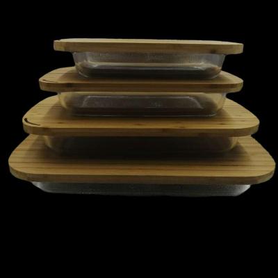 China Viable Rectangular Heat Resistant Glassware Glass Mold with Bamboo Lid for Microwave Cooking for sale