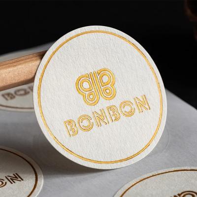 China Custom die cut PVC vinyl label stickers hot sale waterproof circle and oval shape vinyl sticker for packaging labels for sale