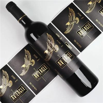 China Waterproof Custom Printing Adhesive Gold Foil Stamping Logo Packaging Label For Wine Bottle for sale