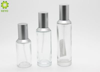 China Sloping Shoulder Clear Glass Pump Bottles 40ml 60ml 80ml 100ml For Cosmetic Packaging for sale