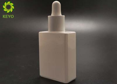 China 0.5OZ Glossy White Glass Small Essential Oil Bottles With Rubber Dropper for sale