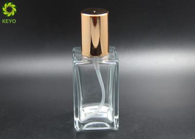 China 120ML Flat Shoulder Spray Pump Glass Bottle With Caps Gold Tops for sale