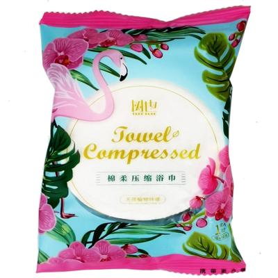 China Hot Sale Compressed Cloth Beach Towels Portable Hygienic Disposable Compressed Bath Towels For One Time Use for sale