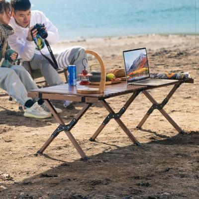 China Easy To Fold And Carry Portable Outdoor Beech Wood Camping Picnic Table Roll Up Camping Dining Tables for sale