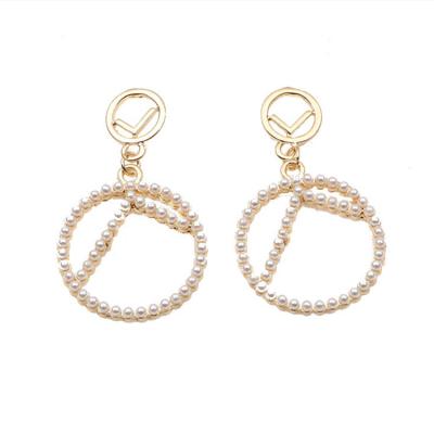 China New Korean Style Casual/Sporty Korean Style Casual/Sporty Fashion Home Fashion Pearl Border Circle Alloy Earrings New Custom Geometric Pearl Earrings for sale