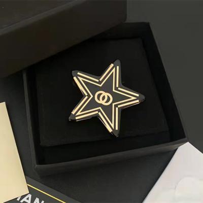 China Small fragrant black five-pointed brooch LOGO Phnom Penh fashion new European and American style spring letter C and autumn star C for sale