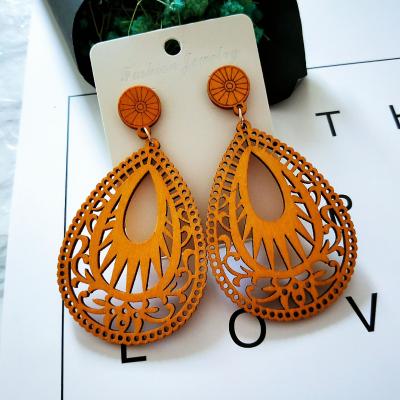 China BOHEMIA Vintage WaterDrop Earrings Cavity Wooden Laser Cut Dangle Earrings For Women Party Aretes Madera for sale