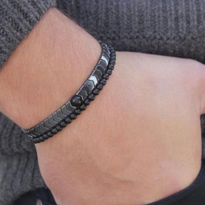 China Ethnic Men Fashion Charm Hematite Bracelet Simple Handmade Magnetic Therapy Bracelet Lava Bangles Volcanic for sale