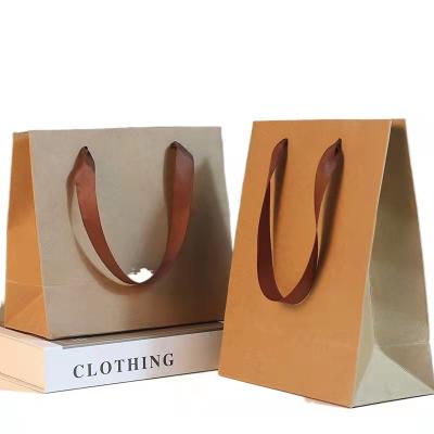 China Wholesale Recyclable Brown Kraft Custom Gift Craft Shopping Paper Bags With Handle for sale