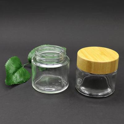 China Rotary Lid Cover Child Safe Cosmetic Unlocking Eye Cream Glass Clear Frosted Bottle for sale