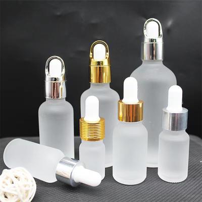 China Cosmetic Tincture Gold Body Parts Dropper Serum Cosmetic Cap Bottles For Essential Oil Glass for sale