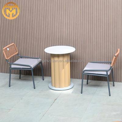 China Modern luxury aluminum patio furniture outside restaurant garden dining table and rattan chairs set for sale