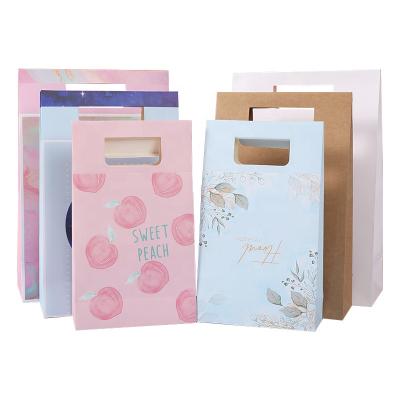 China Food Packaging Bag Recyclable Kraft Paper Quick Bag With Die Cut Handle for sale