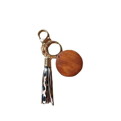 China Wood Personalized DIY Metal Keychains Key Chain Wood Wooden Disc Chip Wooden Keychain With Tassel for sale